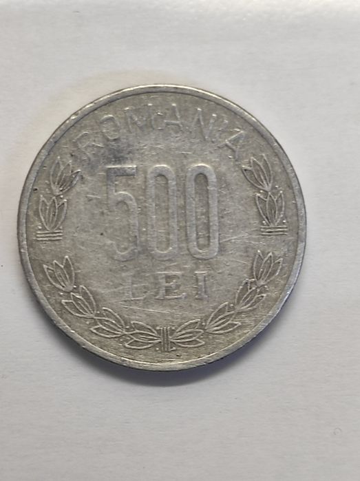 Vând monedă de 500 lei din 1999.