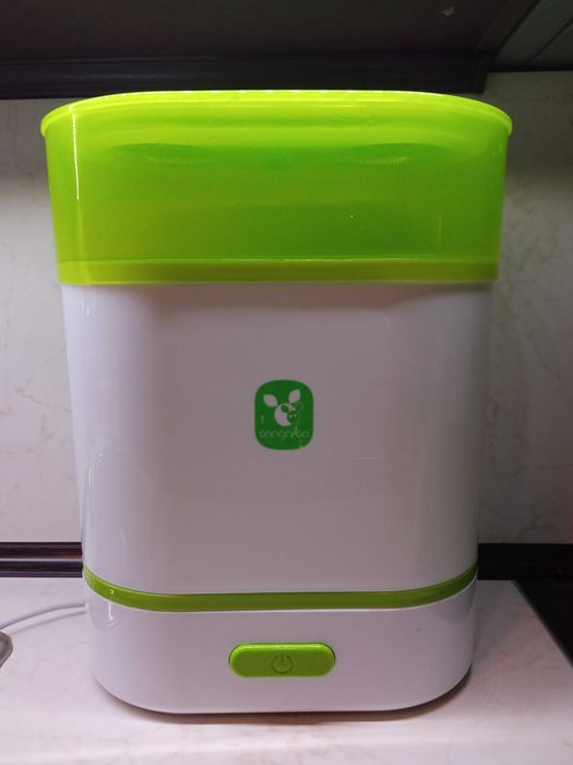 Стерилизатор за бебешки шишета и приготвяне на храна на пара