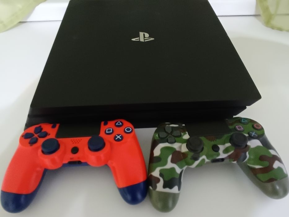 PS4pro  1 TB+8 jocuri