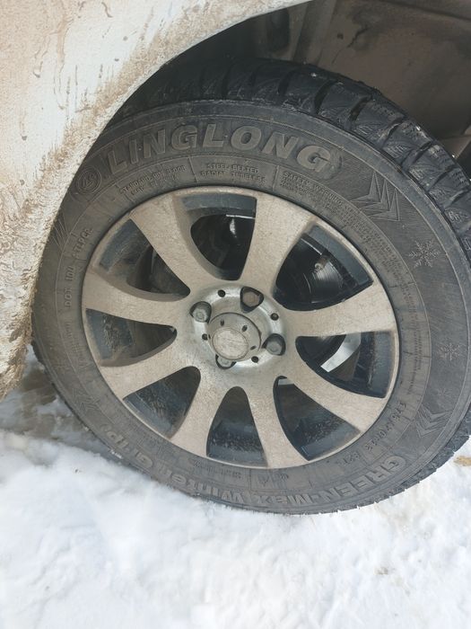 Продам литые диски с шипованной резиной