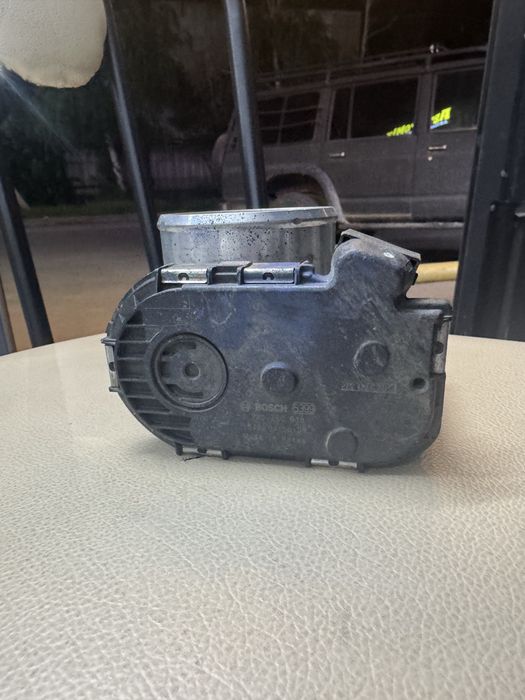 Дроссельная заслонка