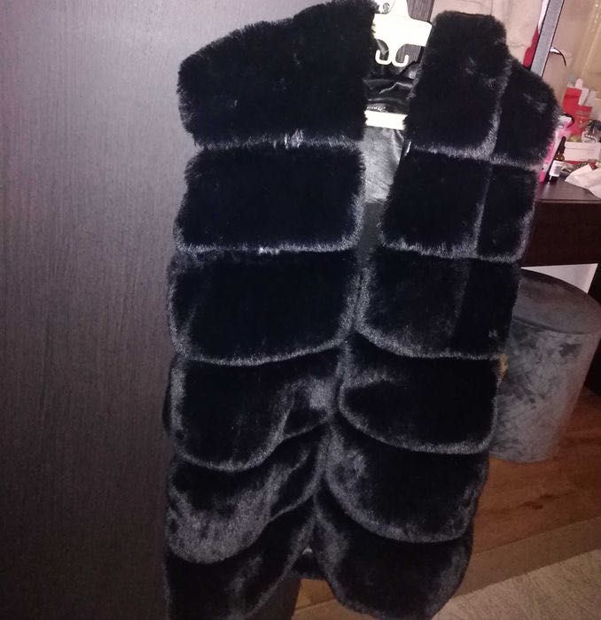 Vesta blana artificială