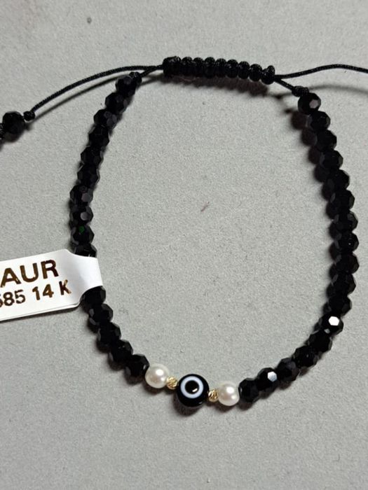 Brățară cu biluțe de aur