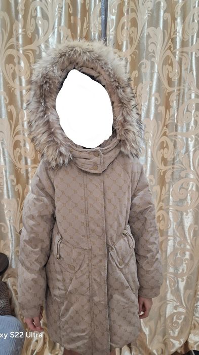 Продам зимний пуховик