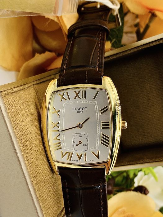 Фирменные Швейцарские заводские золотые часы Tissot