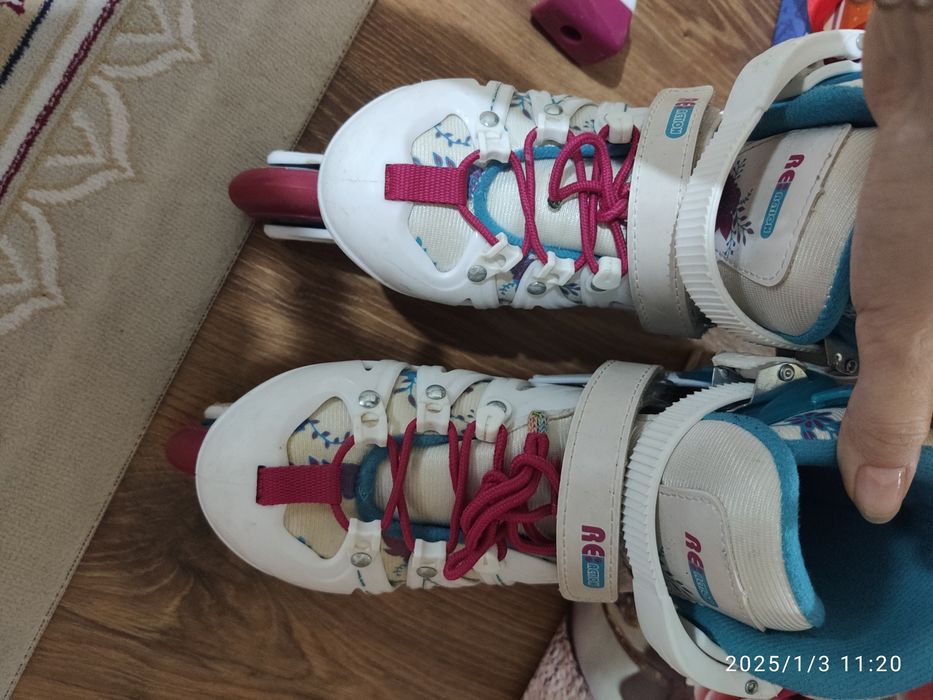 Роликовые коньки б/у