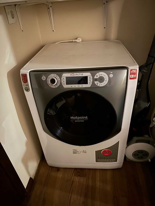 Mașină de spălat cu uscător Hotpoint Ariston Aqualtis, 9kg/7kg, CA NOUĂ