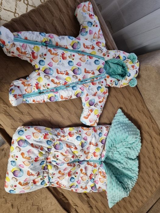 продам зимний комбинезон  с конвертом