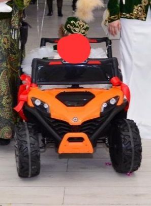 Электромобиль оранжевый