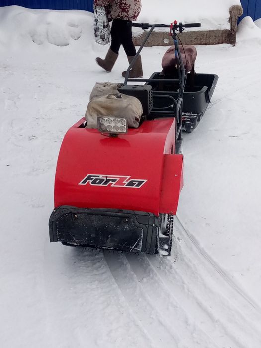 МОТО буксировщик