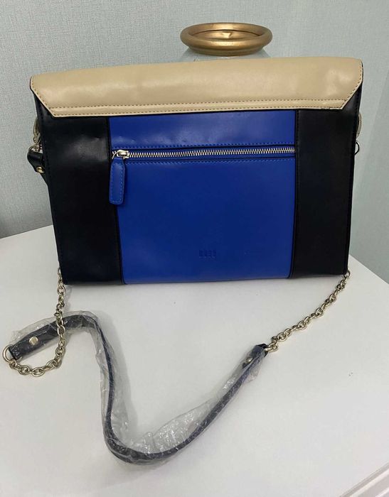 Новый кожаный клатч с ремнем