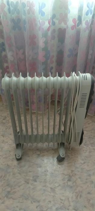 Обогреватель масляный Elenberg.