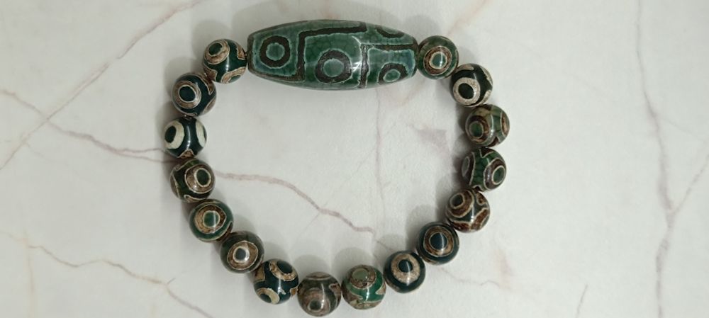 Бусина Дзи 9 глазка