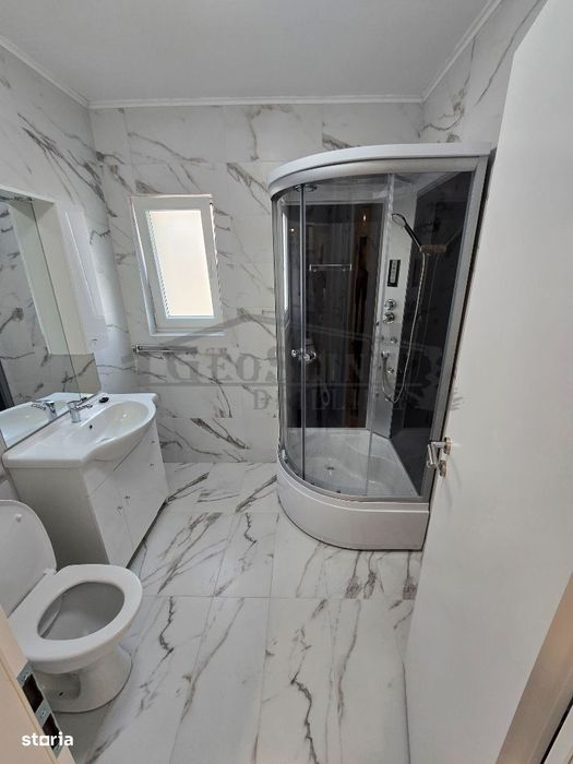 Apartament 2 dormitoare 1 open-space Parcare subterană privată inclusă