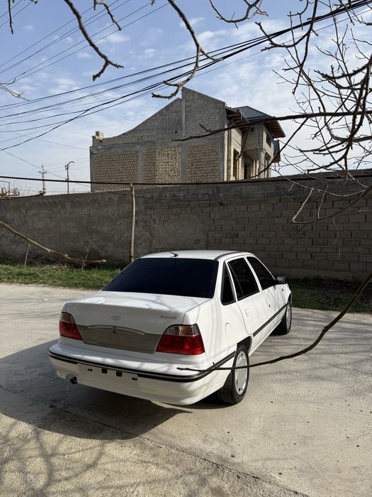 Nexia 1 DOHC 2006 yil kam probegli yangi holatda