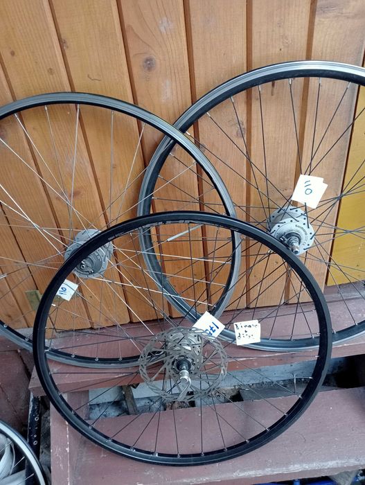 Set roti 28 frana disc Shimano Deore   Roti fata 29 DT Swiss complete