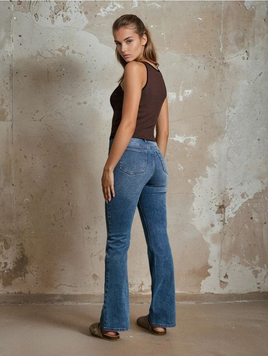 Дамски дънки разкроени