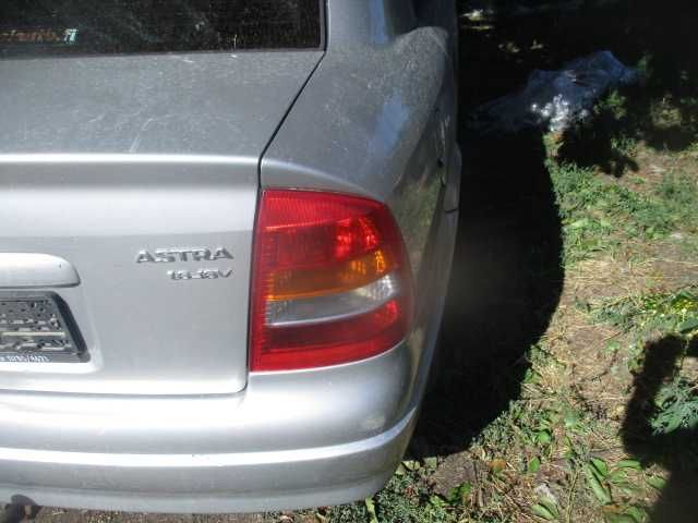 Tripla stop stanga dreapta OPEL ASTRA G sedan scurt si BERTONE