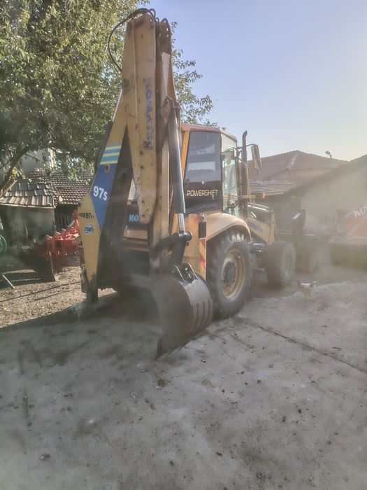 Продавам комбиниран багер