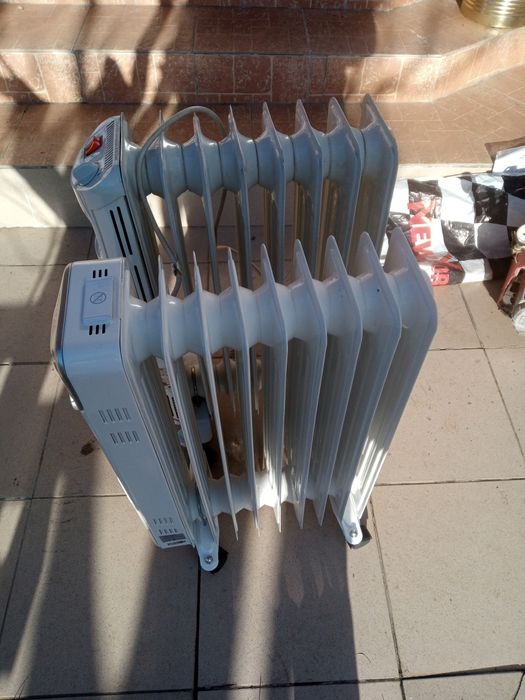 vând calorifer electric cu ulei