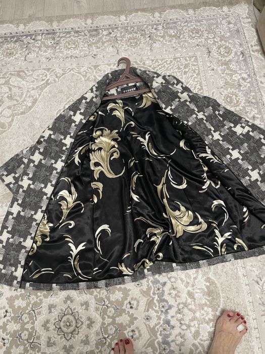 Стильное пальто полутрапеция