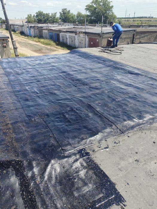 Кровля гаражей бикростом.