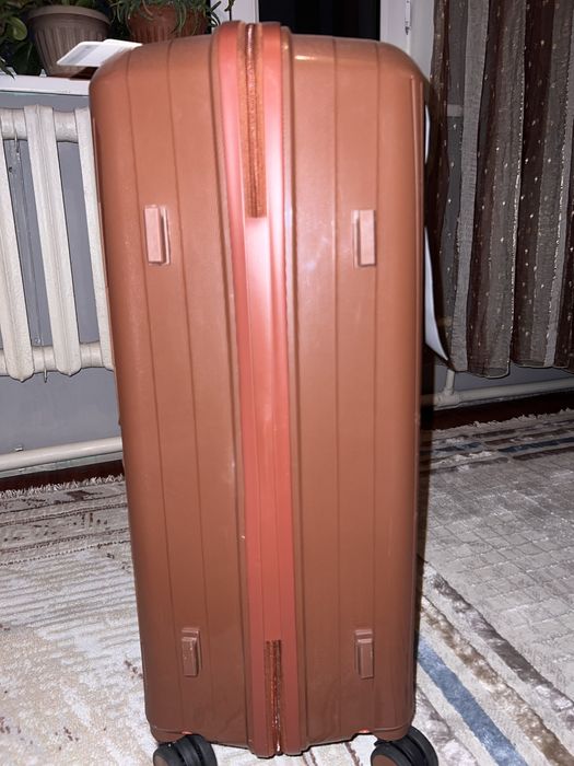 Жаңа стильді чемодан