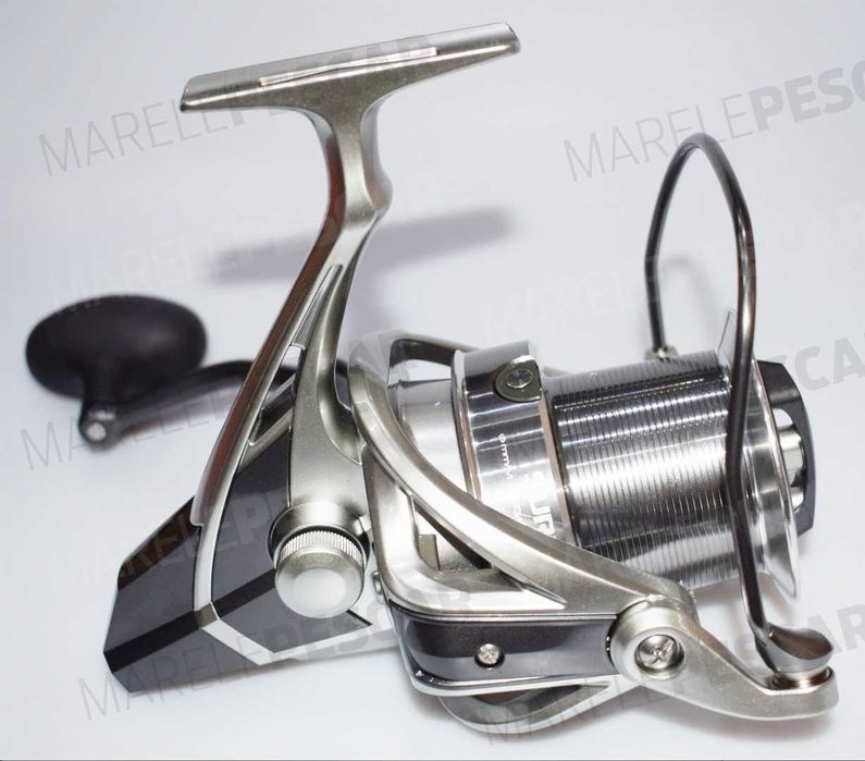 Vand mulinete  Okuma Surf 8K impecabile