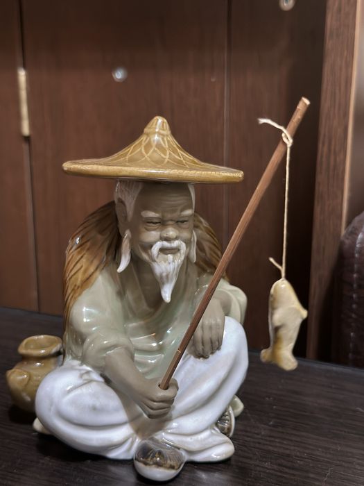 bibelou chinezesc cu undita si peste