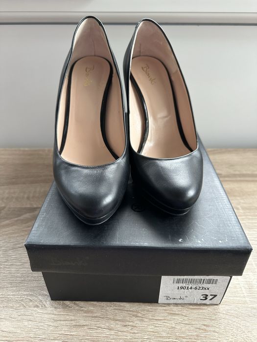 Черни обувки от естествена кожа на висок ток