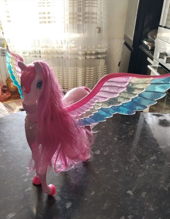 Игрушка лошадка , для девочки. Состояние идеальное.