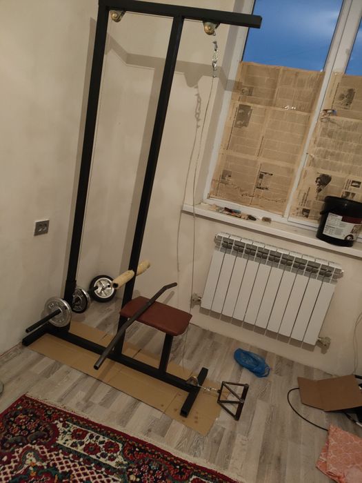 Тренажёр тяга верхнего блока