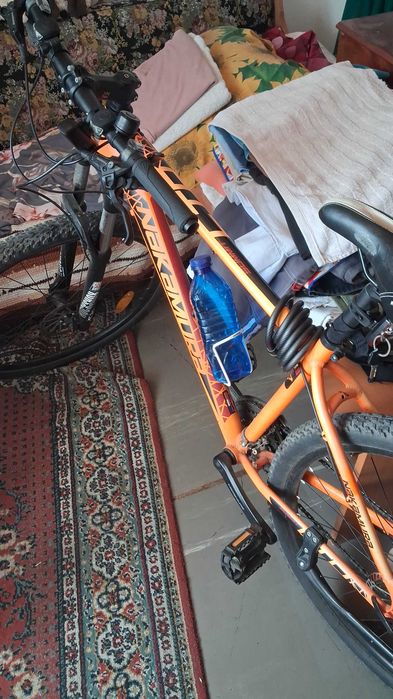 De vanzare  bicicleta nakamura portocalie din franta