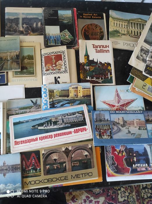 Наборы открыток и схемы городов.