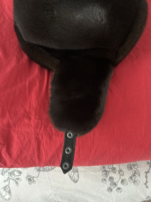 Продам шарку-ушанку в отличном состояний