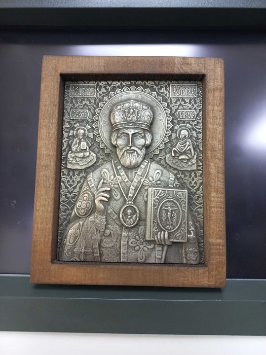 Посребрени икони на Богородица,Св.Николай,Св.Георги и Архангел Михаил.