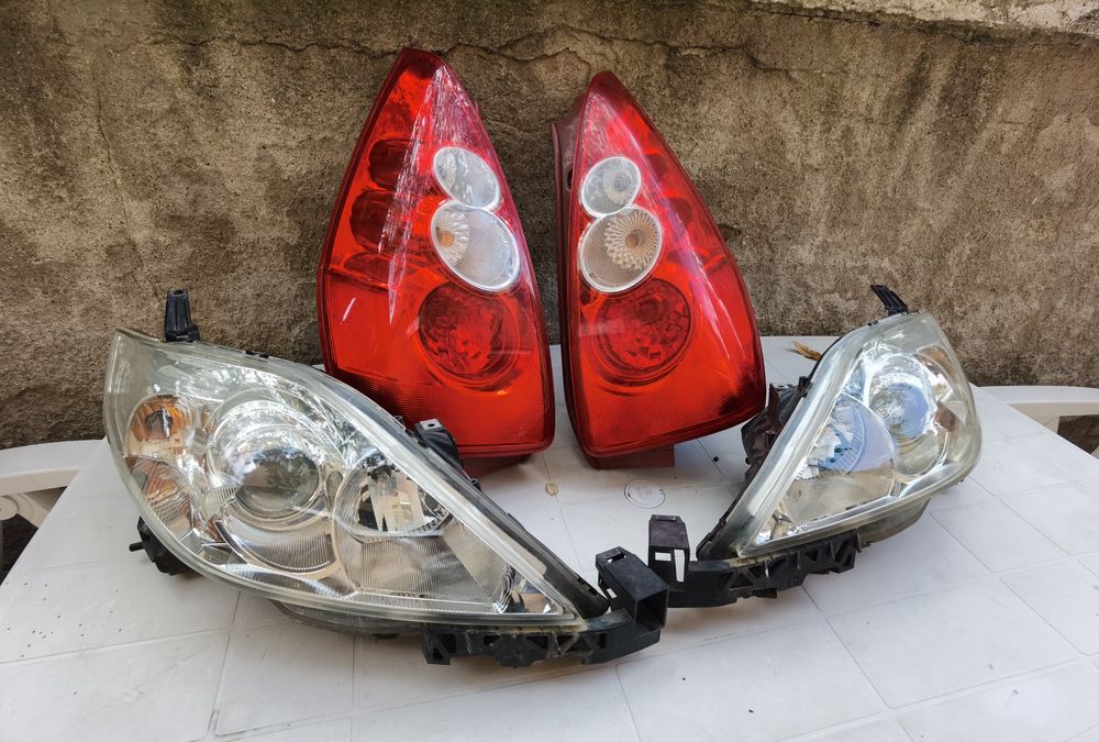 Фарове Mazda 5.Стопове Голф 5. . Пежо 307 комби. Рено Сценик 2