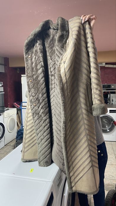Haină damă cu blană naturală – elegantă, calduroasa top