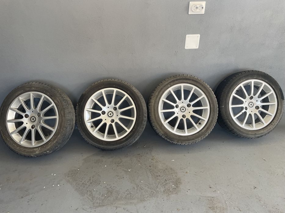 Vand 4 jante aluminiu cu anvelope vara R 15