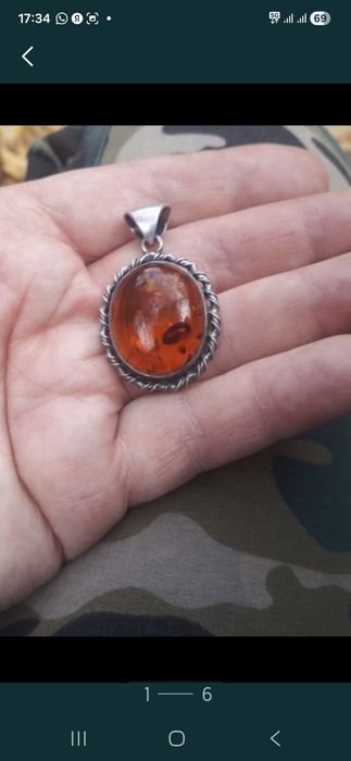 Серебряный кулон.