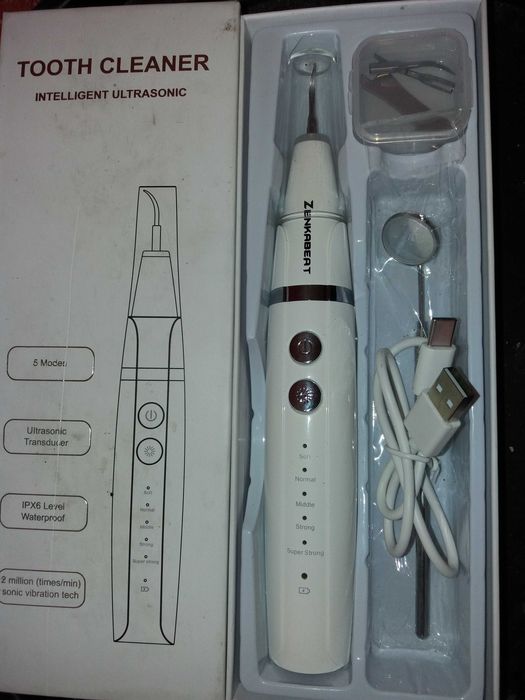 Aparat eliminat tartru periuta dinti zambet curat detartraj ultrasonic