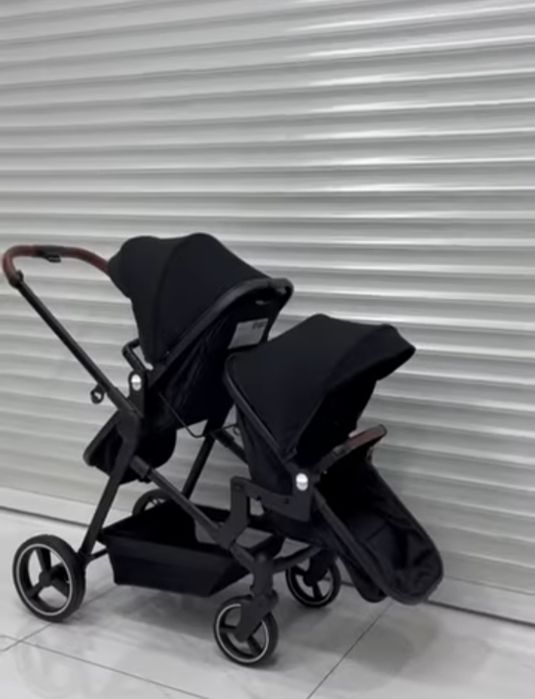 Детская двойная каляска