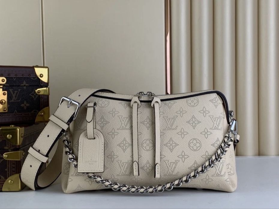 Geantă Louis Vuitton Hand It All PM Mahina Leather