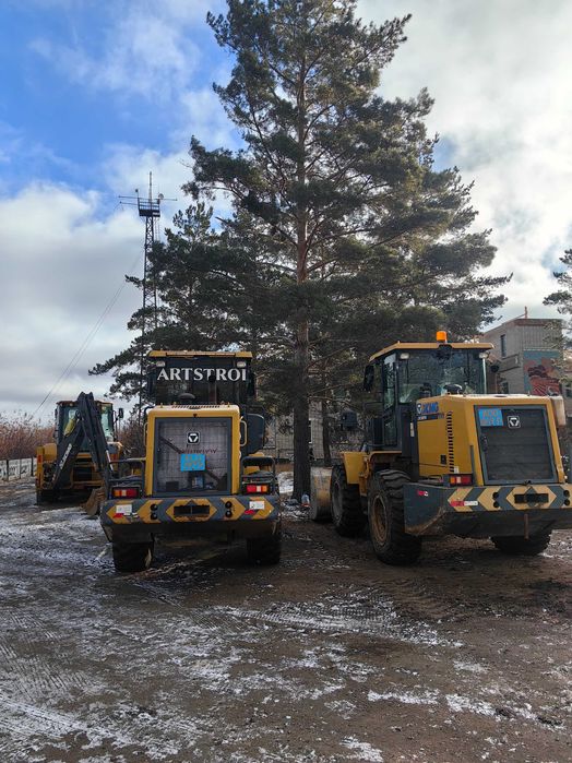 Фронтальный погрузчик.