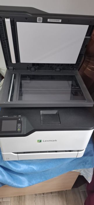 Imprimantă multifuncțională laser