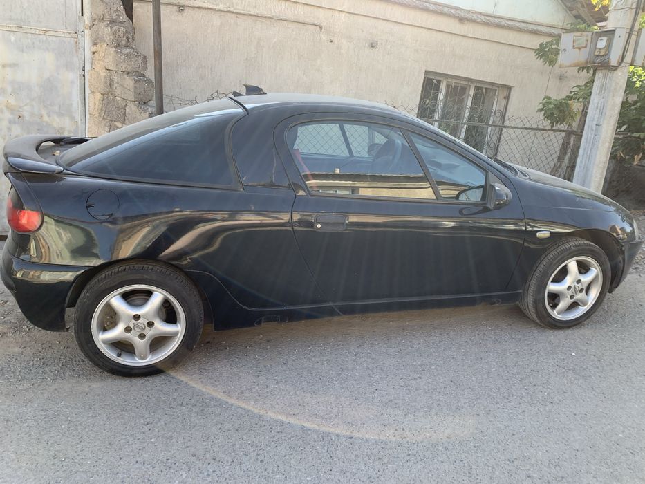 Opel tigra  машина
