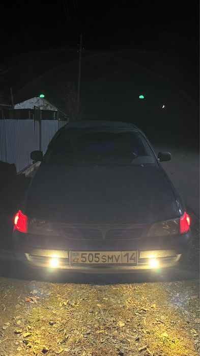 Тойота карина е.