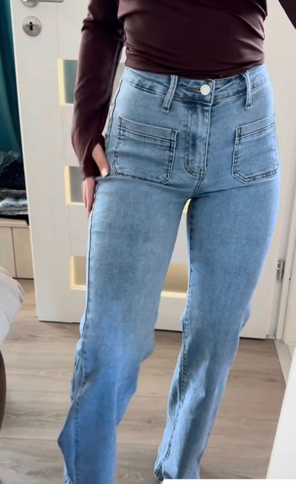 Blugi evazați elastici mărimea M