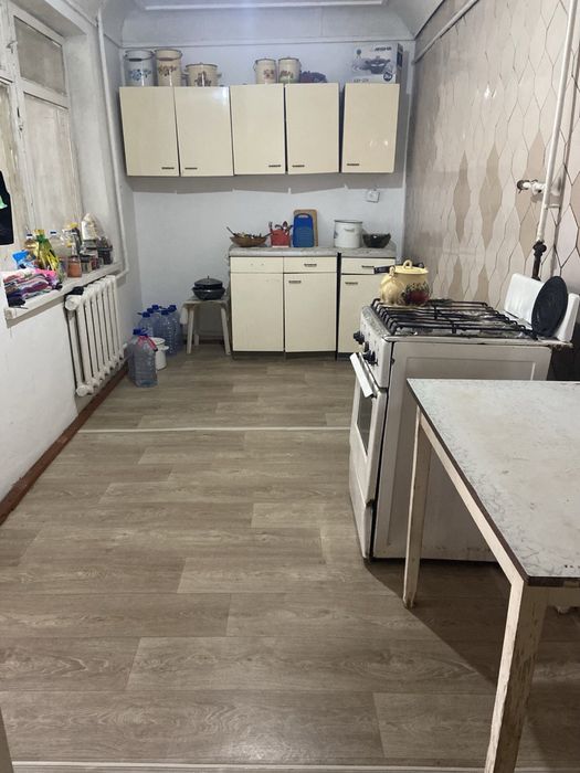 Двухэтажный дом с пристройкой