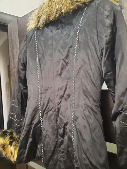 Продам куртку с мехом.